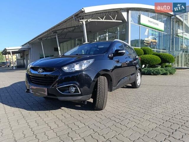 Чорний Хендай іх35, об'ємом двигуна 2 л та пробігом 237 тис. км за 12950 $, фото 22 на Automoto.ua