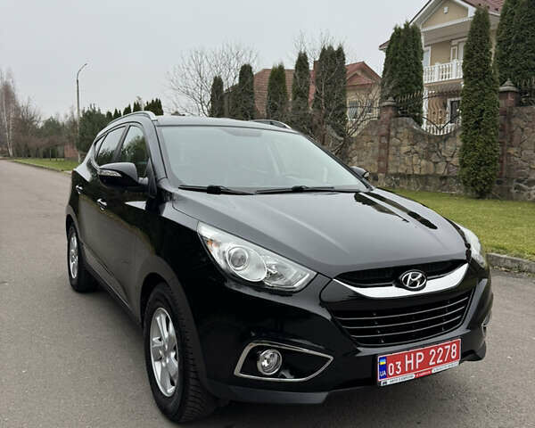 Чорний Хендай іх35, об'ємом двигуна 2 л та пробігом 177 тис. км за 14650 $, фото 8 на Automoto.ua
