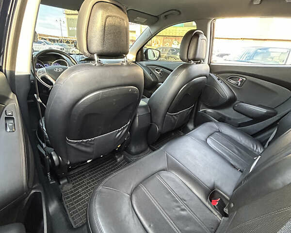 Чорний Хендай іх35, об'ємом двигуна 2 л та пробігом 241 тис. км за 14400 $, фото 22 на Automoto.ua