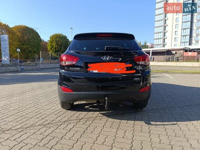 Чорний Хендай іх35, об'ємом двигуна 2 л та пробігом 237 тис. км за 12950 $, фото 17 на Automoto.ua