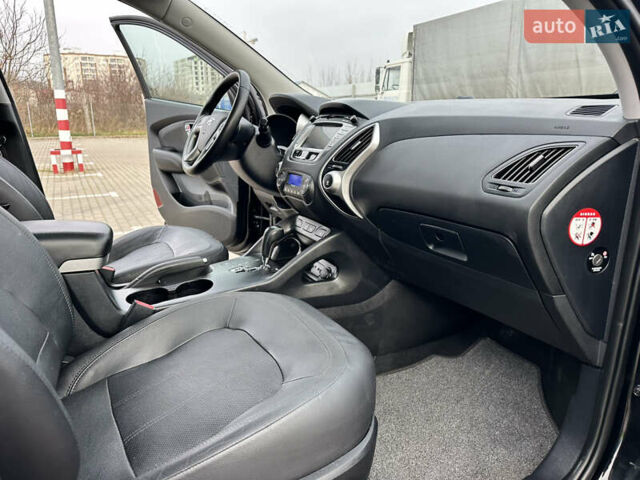 Чорний Хендай іх35, об'ємом двигуна 2 л та пробігом 148 тис. км за 14599 $, фото 39 на Automoto.ua