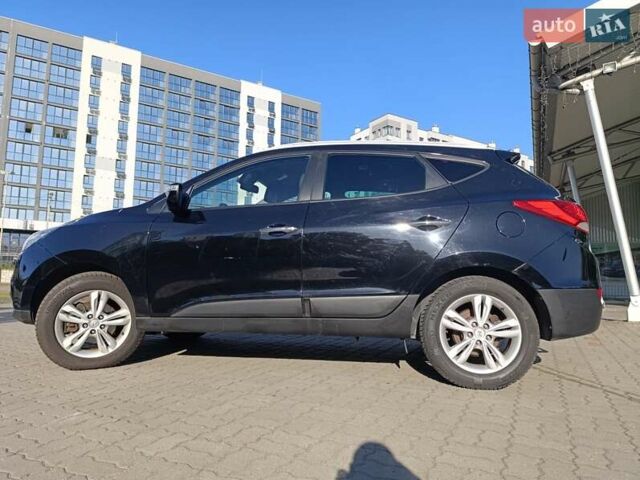 Чорний Хендай іх35, об'ємом двигуна 2 л та пробігом 237 тис. км за 12950 $, фото 13 на Automoto.ua