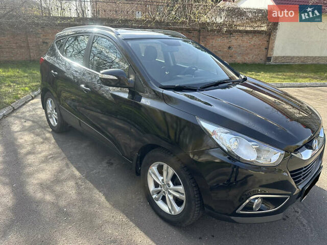 Черный Хендай их35, объемом двигателя 2 л и пробегом 48 тыс. км за 15500 $, фото 8 на Automoto.ua