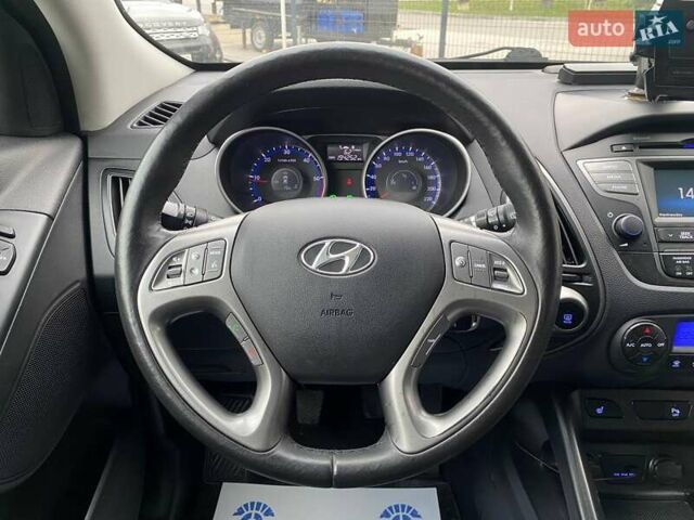 Черный Хендай их35, объемом двигателя 1.69 л и пробегом 194 тыс. км за 12500 $, фото 11 на Automoto.ua