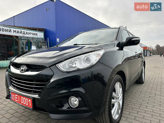Чорний Хендай іх35, об'ємом двигуна 2 л та пробігом 148 тис. км за 14599 $, фото 12 на Automoto.ua