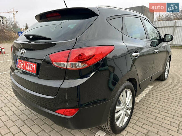 Чорний Хендай іх35, об'ємом двигуна 2 л та пробігом 148 тис. км за 14599 $, фото 16 на Automoto.ua