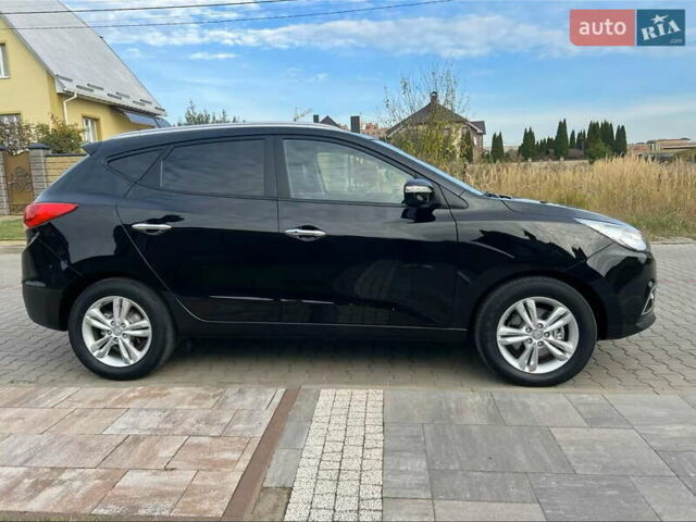 Черный Хендай их35, объемом двигателя 2 л и пробегом 202 тыс. км за 15700 $, фото 8 на Automoto.ua