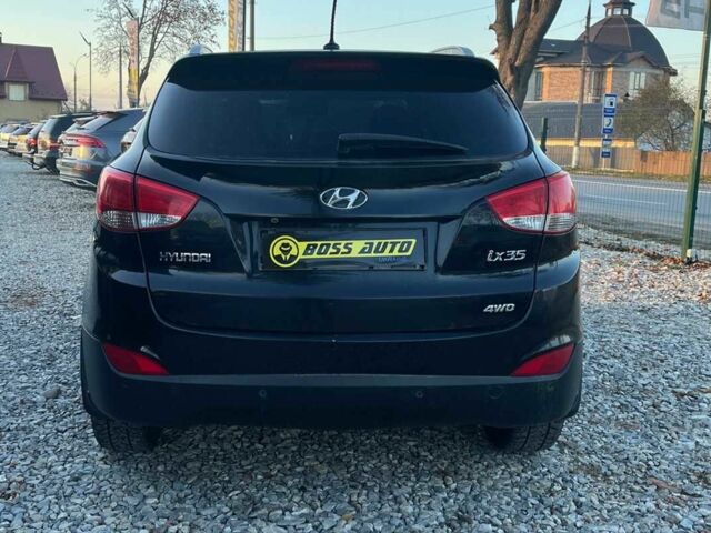 Чорний Хендай іх35, об'ємом двигуна 2 л та пробігом 178 тис. км за 13700 $, фото 5 на Automoto.ua