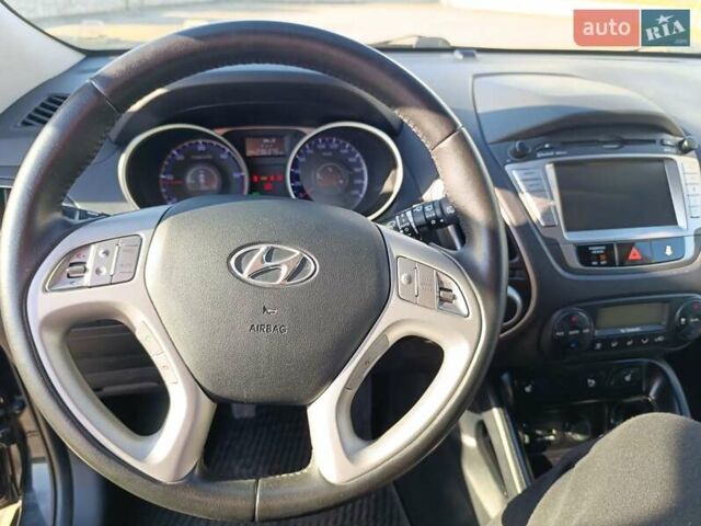 Чорний Хендай іх35, об'ємом двигуна 2 л та пробігом 237 тис. км за 12950 $, фото 2 на Automoto.ua