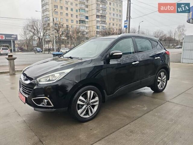 Чорний Хендай іх35, об'ємом двигуна 2 л та пробігом 203 тис. км за 13850 $, фото 5 на Automoto.ua