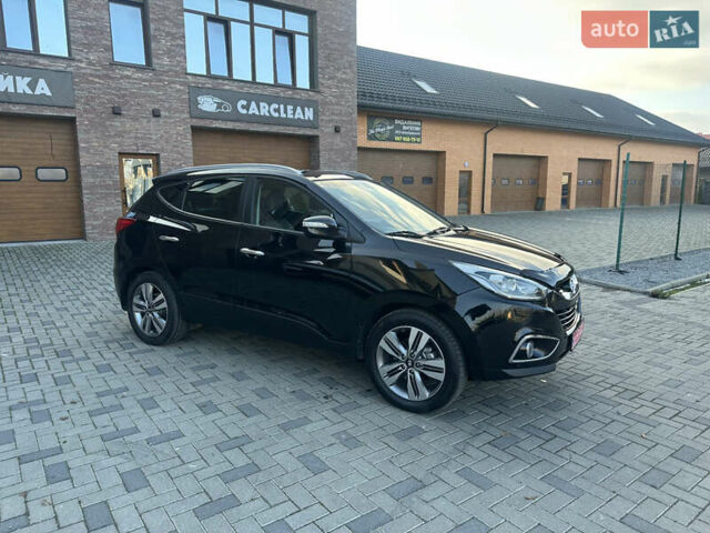 Чорний Хендай іх35, об'ємом двигуна 2 л та пробігом 230 тис. км за 13400 $, фото 1 на Automoto.ua