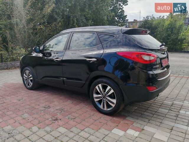 Чорний Хендай іх35, об'ємом двигуна 2 л та пробігом 193 тис. км за 14250 $, фото 31 на Automoto.ua