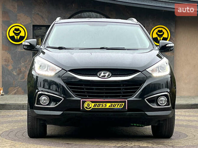 Чорний Хендай іх35, об'ємом двигуна 2 л та пробігом 238 тис. км за 15650 $, фото 1 на Automoto.ua