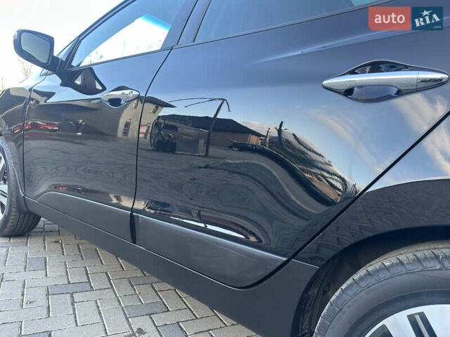 Чорний Хендай іх35, об'ємом двигуна 2 л та пробігом 230 тис. км за 13400 $, фото 21 на Automoto.ua