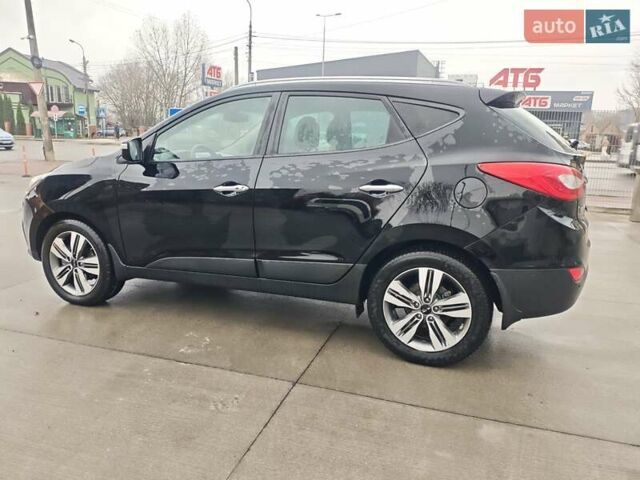 Чорний Хендай іх35, об'ємом двигуна 2 л та пробігом 203 тис. км за 13850 $, фото 10 на Automoto.ua