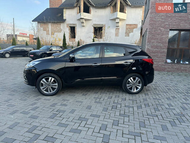 Чорний Хендай іх35, об'ємом двигуна 2 л та пробігом 230 тис. км за 13400 $, фото 3 на Automoto.ua