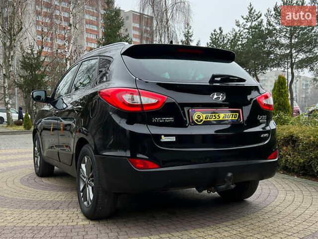 Чорний Хендай іх35, об'ємом двигуна 2 л та пробігом 238 тис. км за 15650 $, фото 4 на Automoto.ua