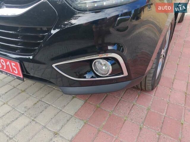 Чорний Хендай іх35, об'ємом двигуна 2 л та пробігом 193 тис. км за 14250 $, фото 1 на Automoto.ua
