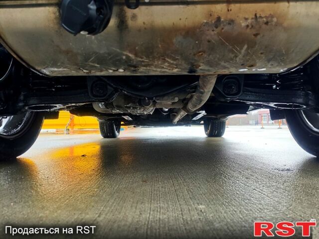 Чорний Хендай іх35, об'ємом двигуна 2 л та пробігом 203 тис. км за 13500 $, фото 12 на Automoto.ua