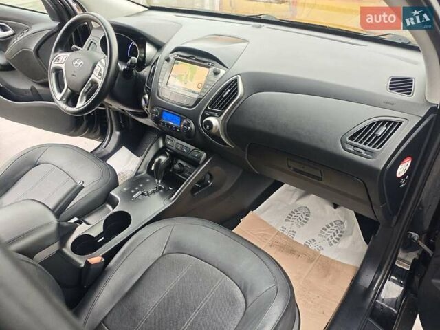 Чорний Хендай іх35, об'ємом двигуна 2 л та пробігом 203 тис. км за 13850 $, фото 28 на Automoto.ua
