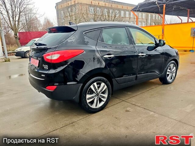 Чорний Хендай іх35, об'ємом двигуна 2 л та пробігом 203 тис. км за 13500 $, фото 7 на Automoto.ua