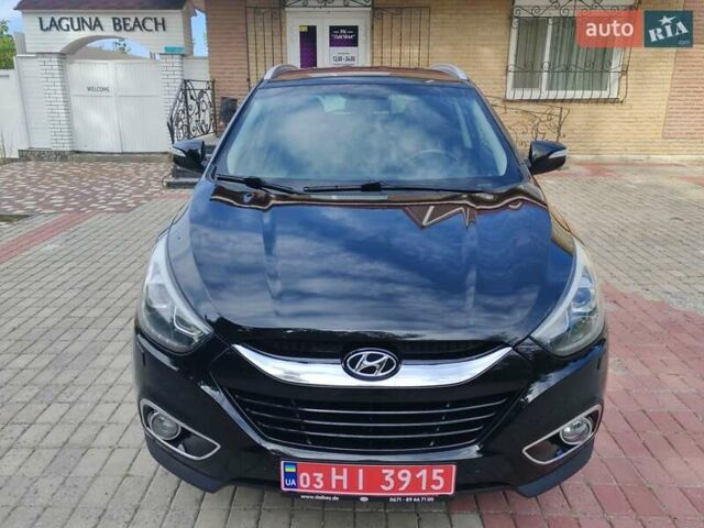 Чорний Хендай іх35, об'ємом двигуна 2 л та пробігом 193 тис. км за 14250 $, фото 8 на Automoto.ua