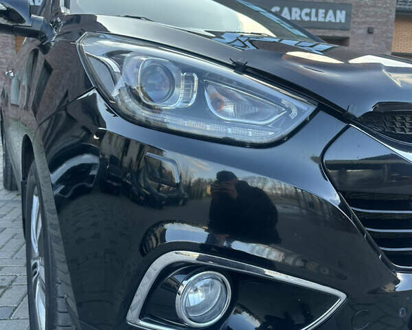 Чорний Хендай іх35, об'ємом двигуна 2 л та пробігом 230 тис. км за 13400 $, фото 12 на Automoto.ua