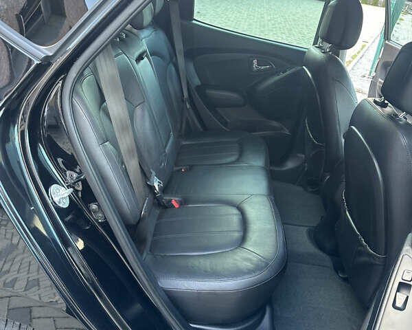 Чорний Хендай іх35, об'ємом двигуна 2 л та пробігом 230 тис. км за 13400 $, фото 47 на Automoto.ua