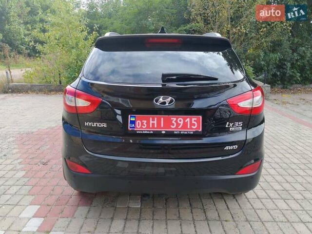 Чорний Хендай іх35, об'ємом двигуна 2 л та пробігом 193 тис. км за 14250 $, фото 10 на Automoto.ua