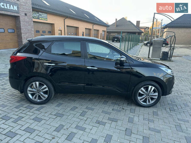 Чорний Хендай іх35, об'ємом двигуна 2 л та пробігом 230 тис. км за 13400 $, фото 19 на Automoto.ua