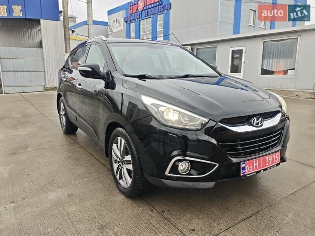 Чорний Хендай іх35, об'ємом двигуна 2 л та пробігом 203 тис. км за 13850 $, фото 7 на Automoto.ua