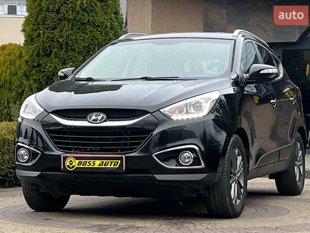 Чорний Хендай іх35, об'ємом двигуна 2 л та пробігом 238 тис. км за 15650 $, фото 2 на Automoto.ua