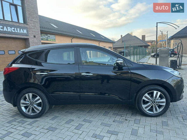 Чорний Хендай іх35, об'ємом двигуна 2 л та пробігом 230 тис. км за 13400 $, фото 5 на Automoto.ua