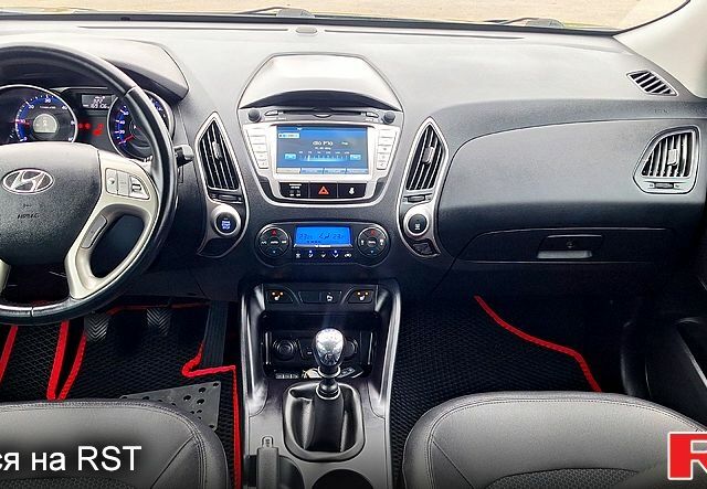 Чорний Хендай іх35, об'ємом двигуна 2 л та пробігом 169 тис. км за 14300 $, фото 10 на Automoto.ua