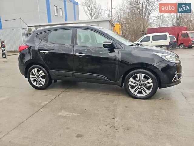 Чорний Хендай іх35, об'ємом двигуна 2 л та пробігом 203 тис. км за 13850 $, фото 3 на Automoto.ua