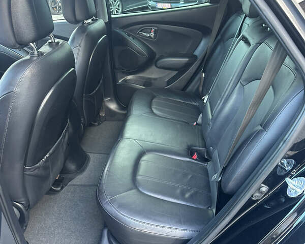 Чорний Хендай іх35, об'ємом двигуна 2 л та пробігом 230 тис. км за 13400 $, фото 40 на Automoto.ua