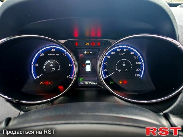 Чорний Хендай іх35, об'ємом двигуна 2 л та пробігом 203 тис. км за 13500 $, фото 4 на Automoto.ua