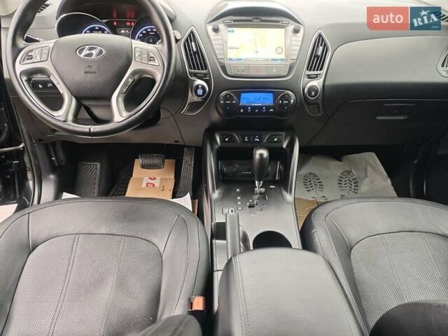 Чорний Хендай іх35, об'ємом двигуна 2 л та пробігом 203 тис. км за 13850 $, фото 29 на Automoto.ua