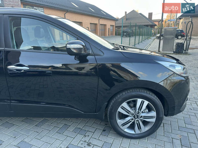 Чорний Хендай іх35, об'ємом двигуна 2 л та пробігом 230 тис. км за 13400 $, фото 29 на Automoto.ua