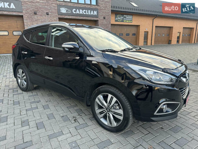 Чорний Хендай іх35, об'ємом двигуна 2 л та пробігом 230 тис. км за 13400 $, фото 76 на Automoto.ua