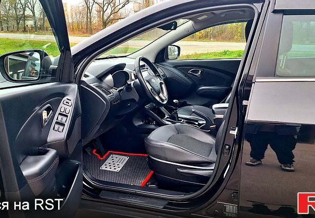 Чорний Хендай іх35, об'ємом двигуна 2 л та пробігом 169 тис. км за 14300 $, фото 7 на Automoto.ua