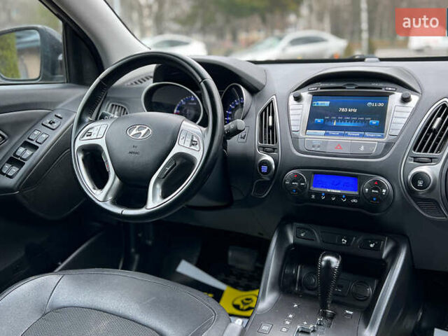 Чорний Хендай іх35, об'ємом двигуна 2 л та пробігом 238 тис. км за 15650 $, фото 18 на Automoto.ua