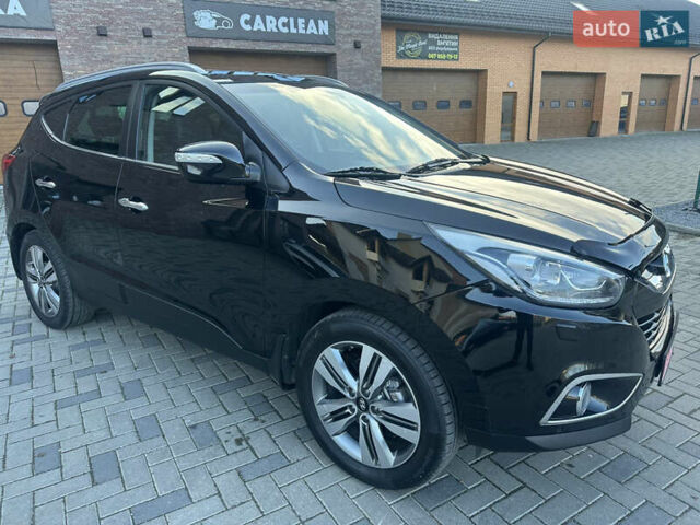 Чорний Хендай іх35, об'ємом двигуна 2 л та пробігом 230 тис. км за 13400 $, фото 6 на Automoto.ua