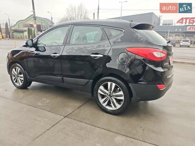 Чорний Хендай іх35, об'ємом двигуна 2 л та пробігом 203 тис. км за 13850 $, фото 8 на Automoto.ua