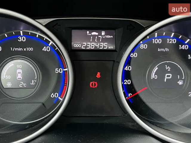 Чорний Хендай іх35, об'ємом двигуна 2 л та пробігом 238 тис. км за 15650 $, фото 12 на Automoto.ua