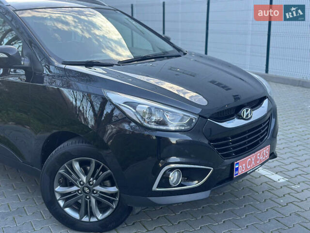 Черный Хендай их35, объемом двигателя 2 л и пробегом 237 тыс. км за 15150 $, фото 1 на Automoto.ua