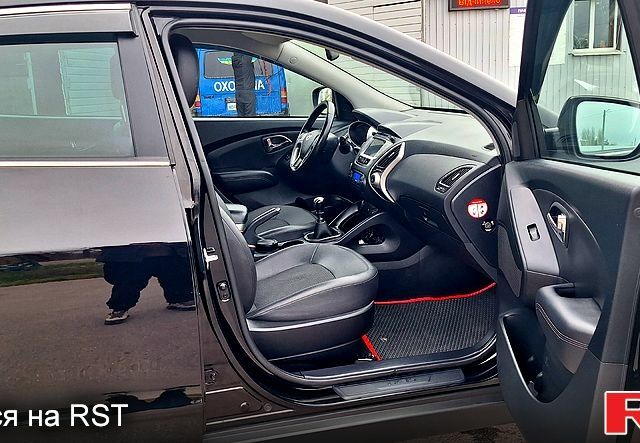 Чорний Хендай іх35, об'ємом двигуна 2 л та пробігом 169 тис. км за 14300 $, фото 9 на Automoto.ua