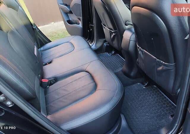 Чорний Хендай іх35, об'ємом двигуна 2 л та пробігом 203 тис. км за 13750 $, фото 24 на Automoto.ua