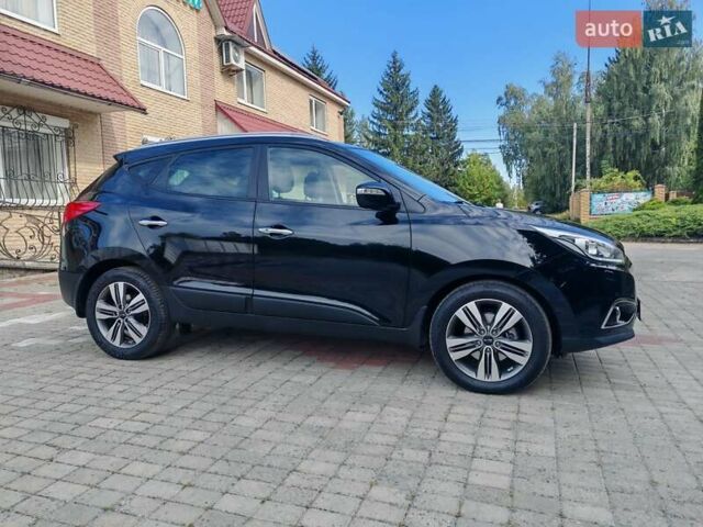 Чорний Хендай іх35, об'ємом двигуна 2 л та пробігом 193 тис. км за 14250 $, фото 33 на Automoto.ua
