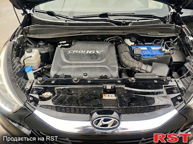 Чорний Хендай іх35, об'ємом двигуна 2 л та пробігом 203 тис. км за 13500 $, фото 3 на Automoto.ua